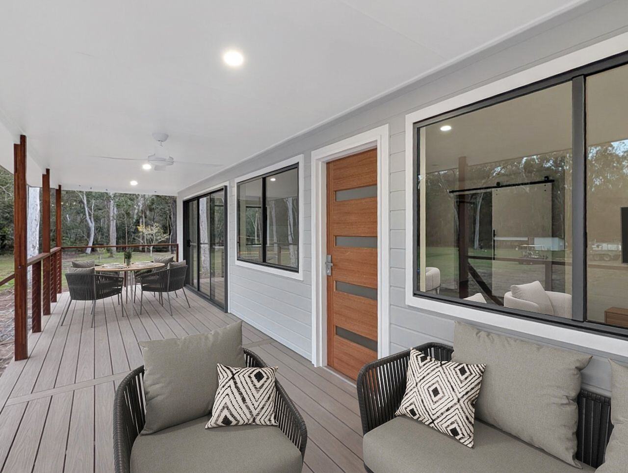 Front deck with timber entry door and outdoor seating